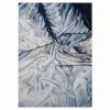 Intimate is a contemporary oil painting depicting unmade bedding in shades of payne's grey and white, evoking a sense of tranquility and intimacy. It also suggests that there is nothing mundane about the mundane