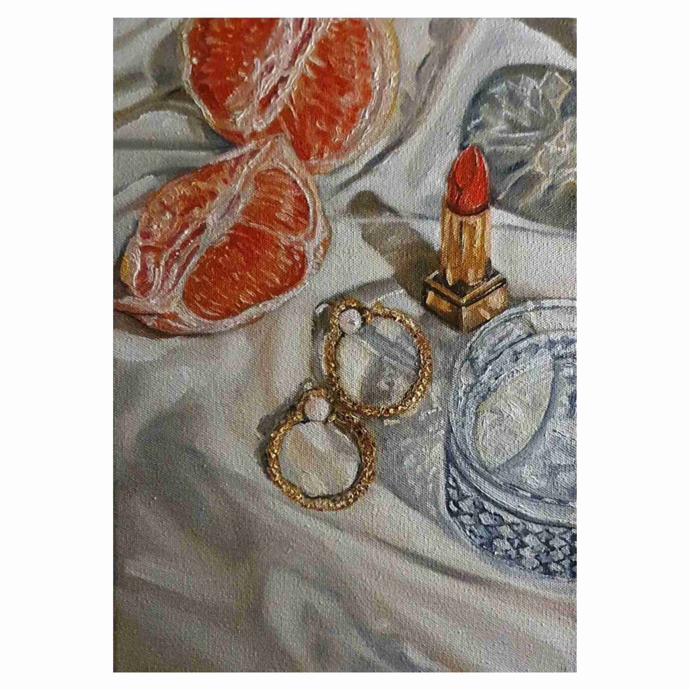 A still life oil painting titled "Moments in Time" depicting a woman's dressing table with silk draping, a crystal whiskey glass, golden hooped earrings with pearls, an open red lipstick, and slices of grapefruit