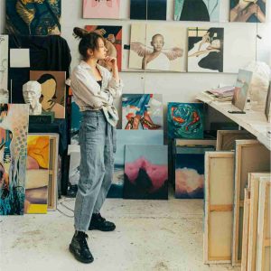 Photo of a girl considering artworks